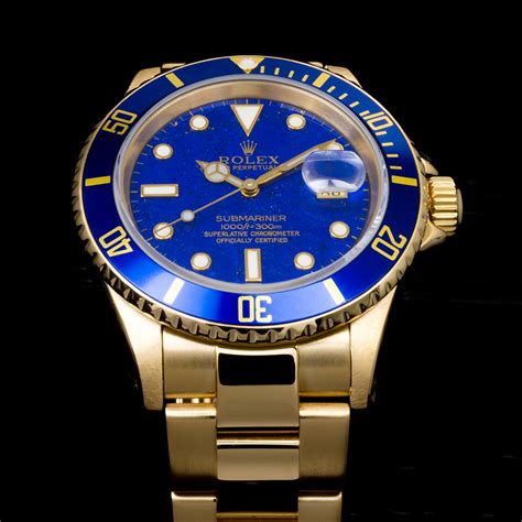 Rolex Submariner Date transizionale vetro zafiro quadrante blu.